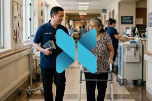 Hospital chaplain walking alongside an elderly woman using a walker in a hospital hallway, offering support and conversation.