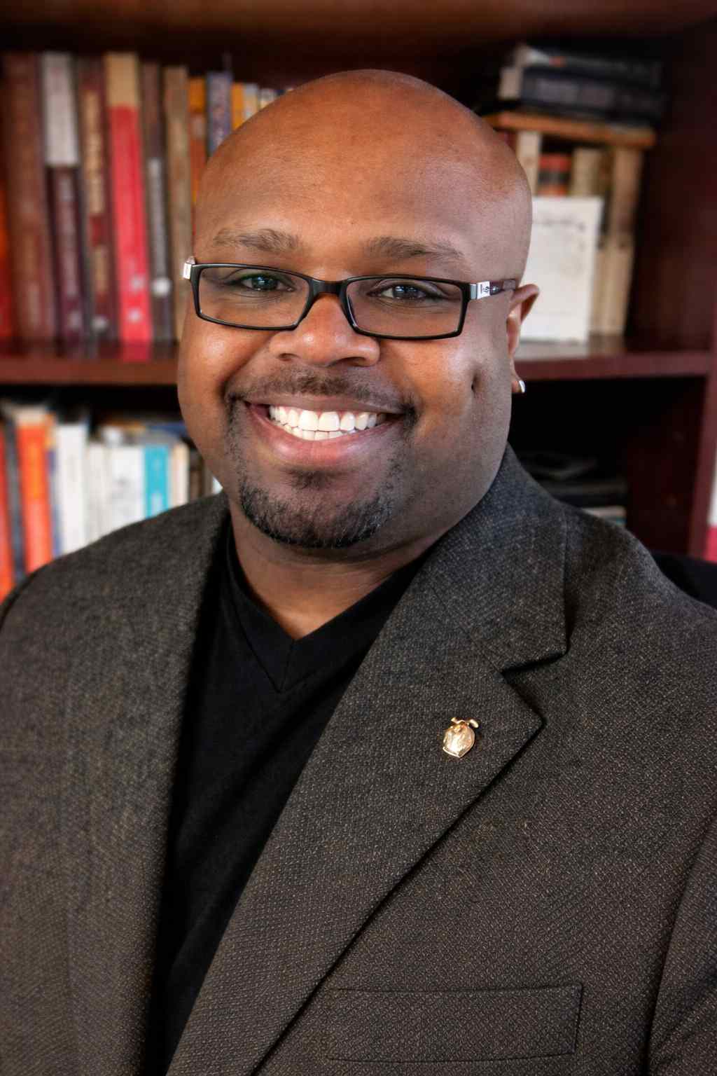 Sports chaplain candidate, Army veteran and former NYPD detective, standing confidently while serving athletes through coaching, mentorship, and Christian spiritual leadership.